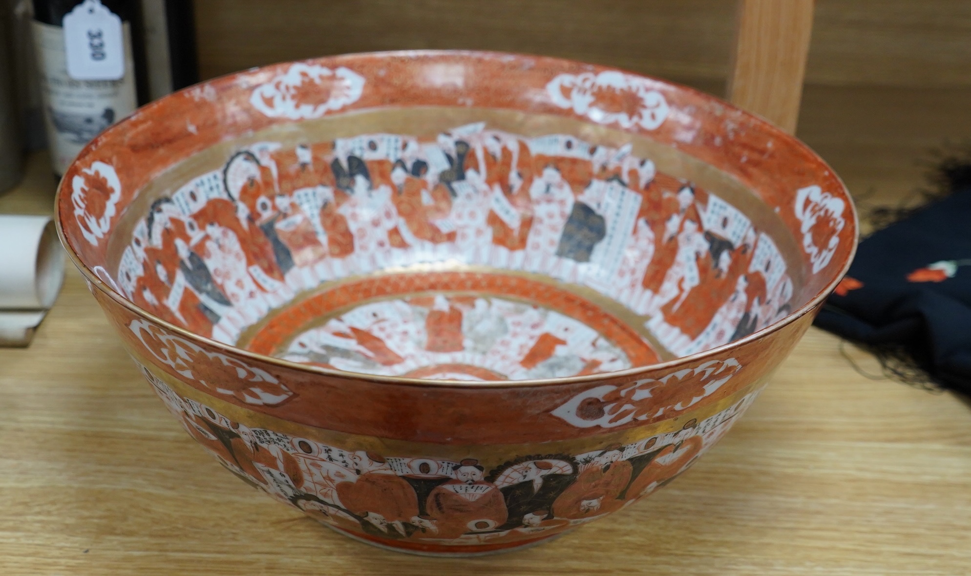 A late 19th century Japanese Kutani punch bowl, 39cm diameter. Condition - fair, chipped